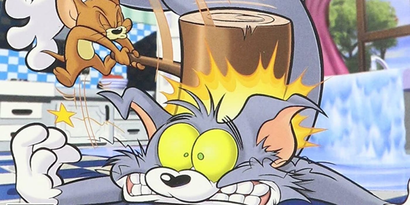 Jerry hitting Tom on the head with a giant hammer on the cover of the Tom And Jerry In War Of The Whiskers video game
