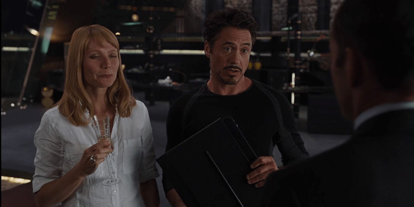 Tony Stark and Pepper Potts talking to Agent Coulson in The Avengers