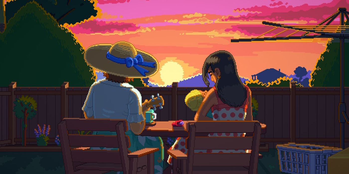 Two women watch a sunset together in the end scene of Unpacking