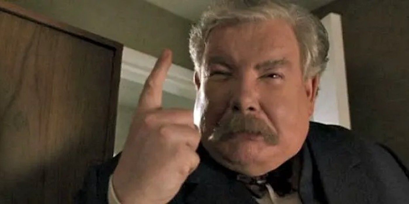 Vernon Dursley, with a scowl and his finger raised