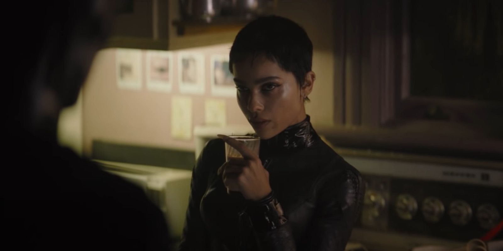 Zoe Kravitz as Catwoman drinking milk in The Batman