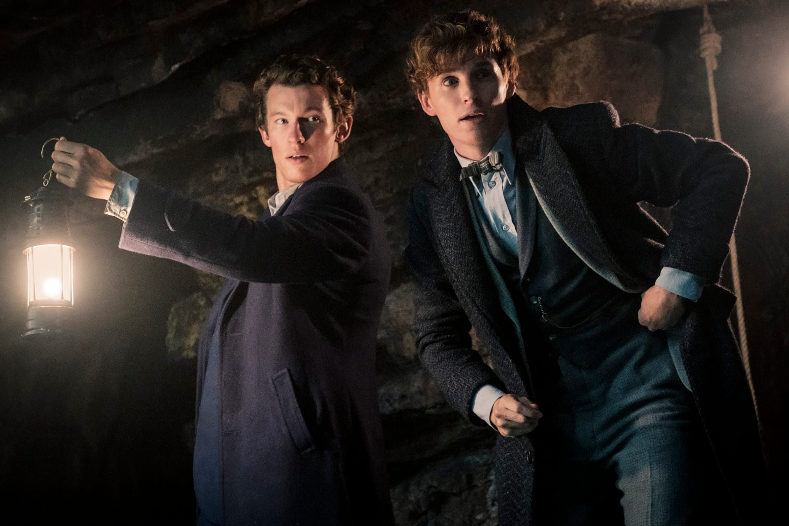 Fantastic Beasts 3 Image Shows Newt & His Brother Exploring A Cave