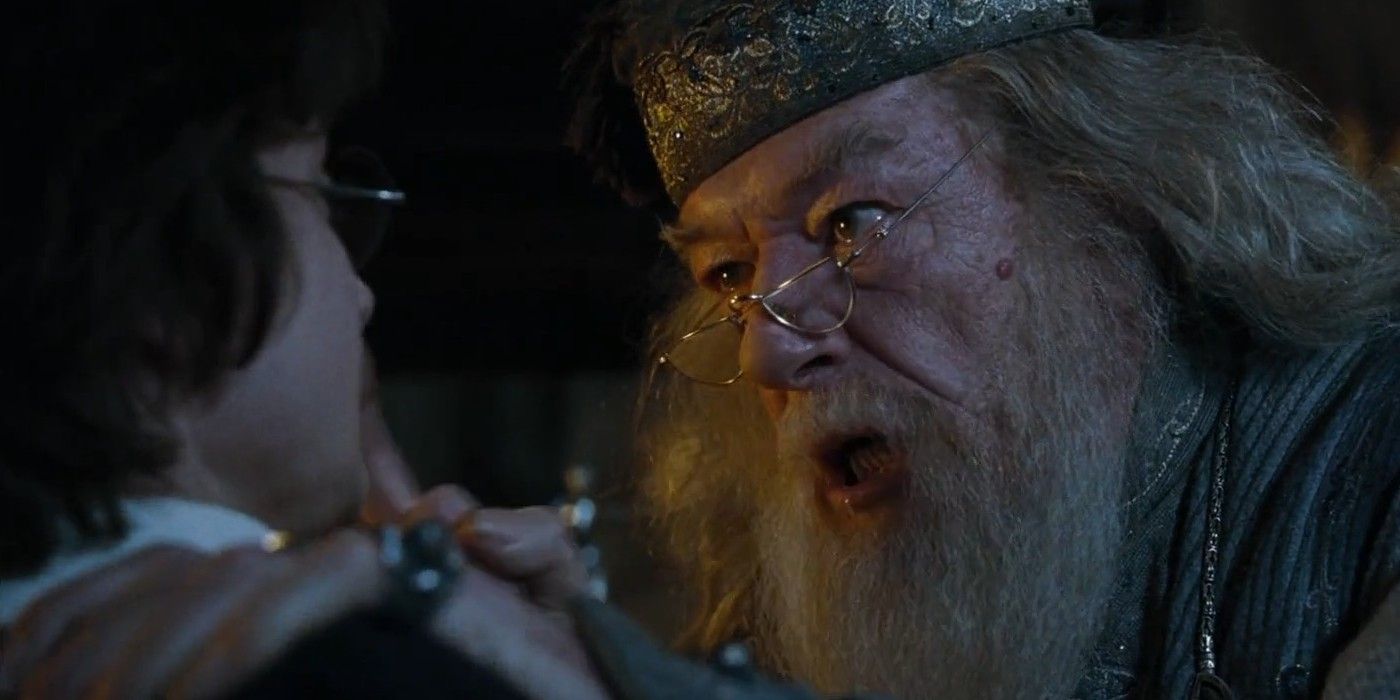 Dumbledore, pushing Harry into a wall