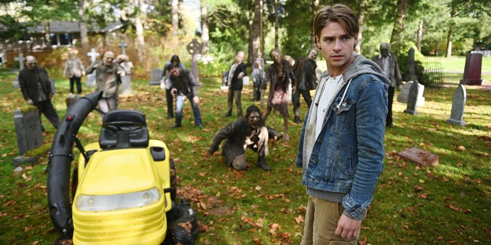 Cam is surrounded by zombies in a cemetery on Day of the Dead