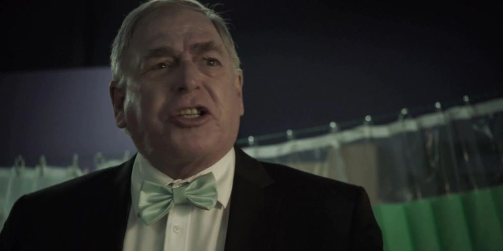 Herb wears a green bow-tie in Day of the Dead