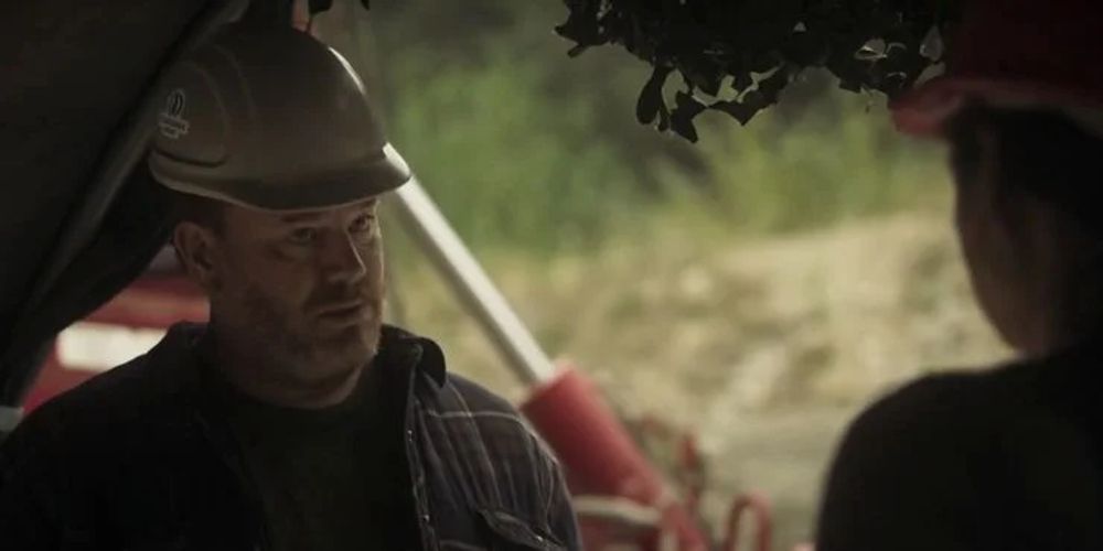 Rhodes wears a hard hat in the mines on Day of the Dead