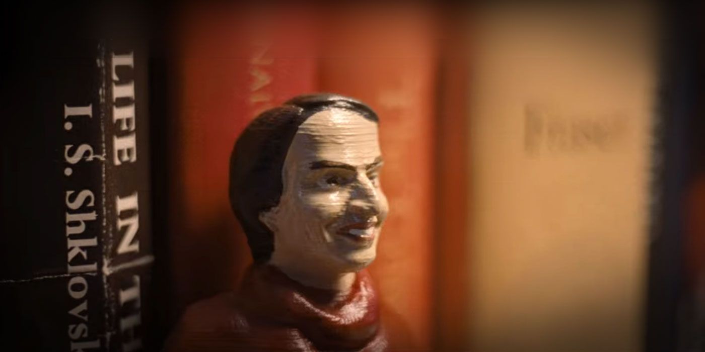 The little wooden Carl Sagan figurine from the beginning of Don't Look Up