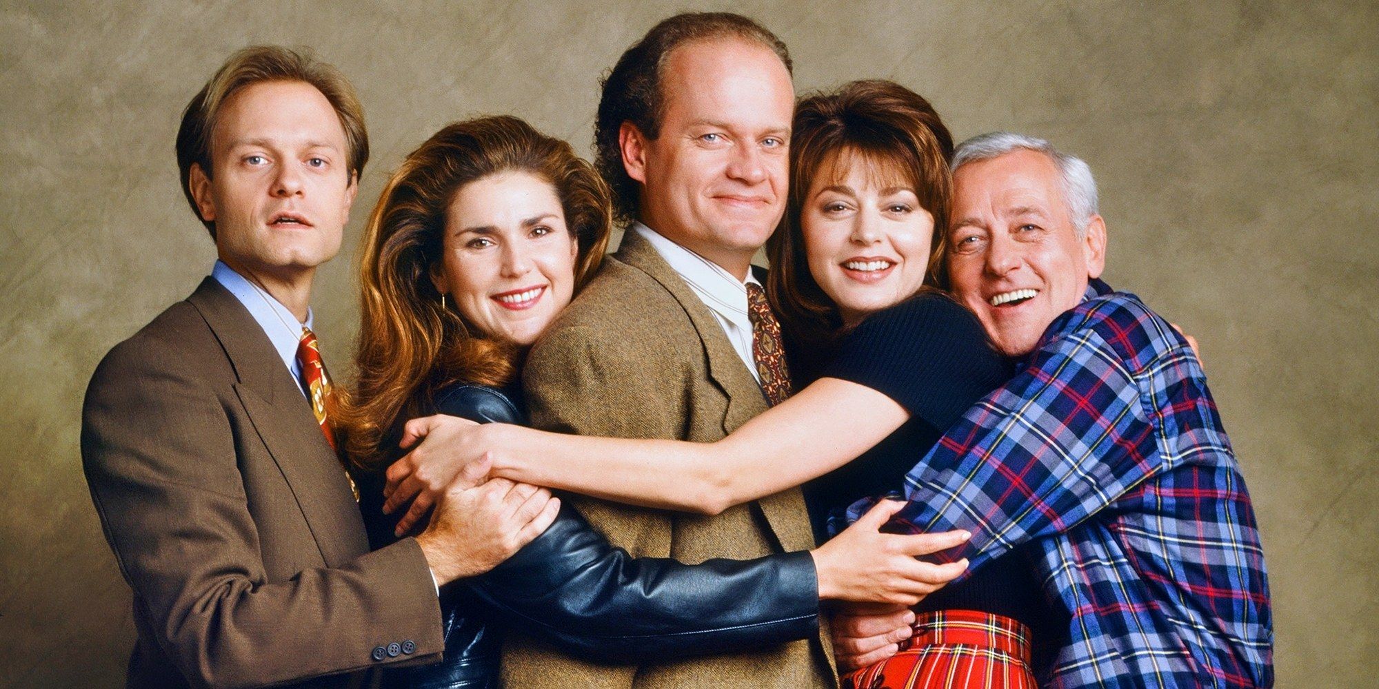 The cast of Frasier hugging