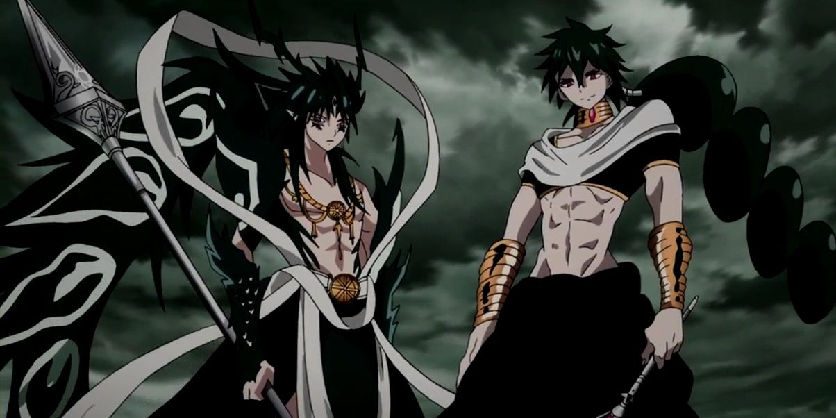 Hakuryuu and Judal stand side by side. Judal looks pleased and Hakuryuu looks grimly determined in Magi: The Labyrinth of Magic.