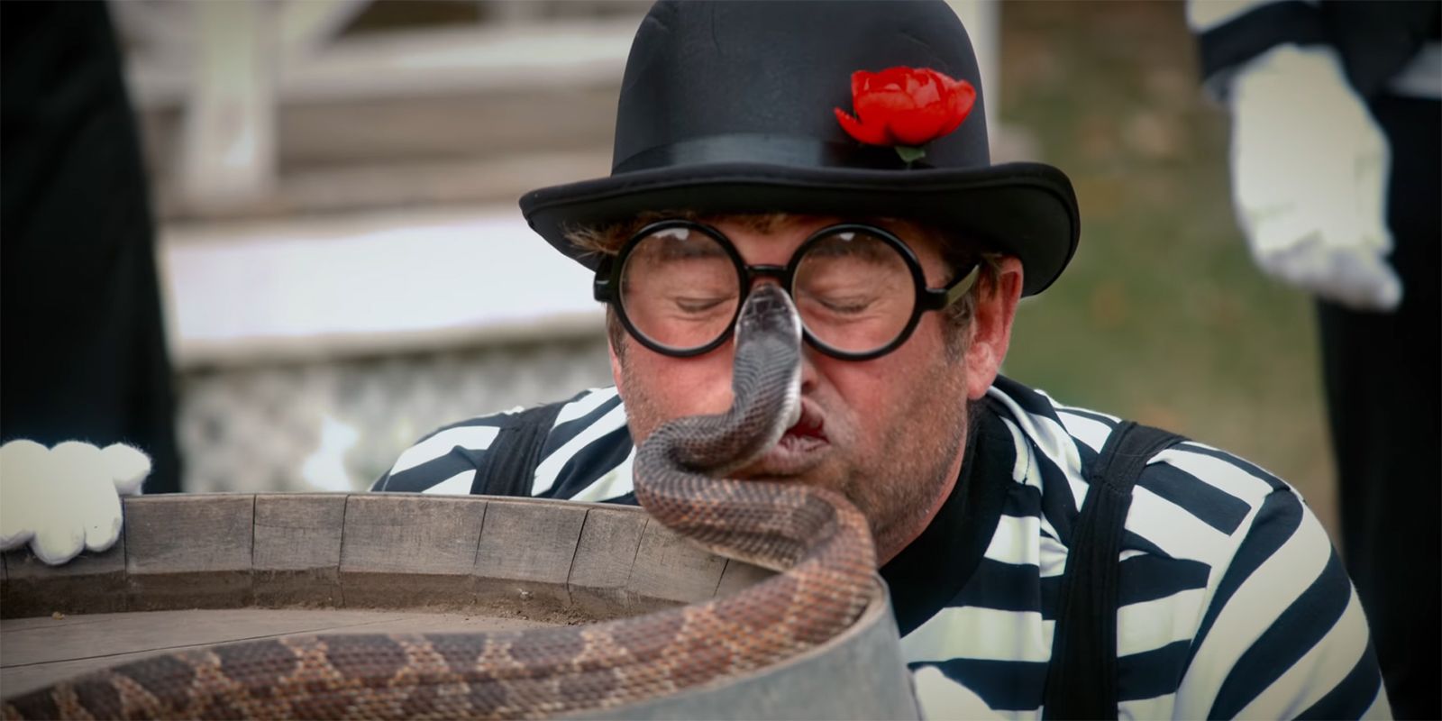 Poopies being bitten by a snake in Jackass Forever