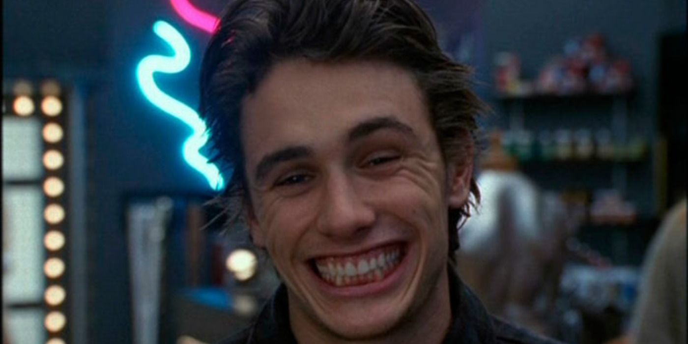 James Franco smiling widely in Freaks and Geeks.