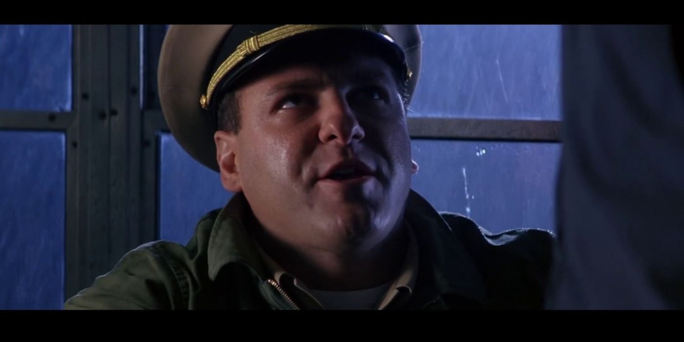 James Gandolfini dressed as a Navy man in the rain in Crimson Tide.