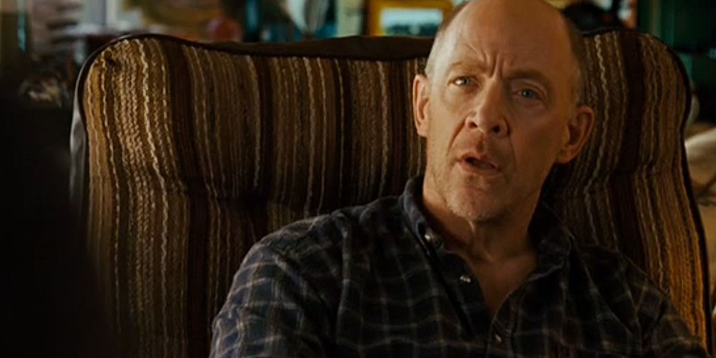 JK simmons looking surprised on the couch in Juno.