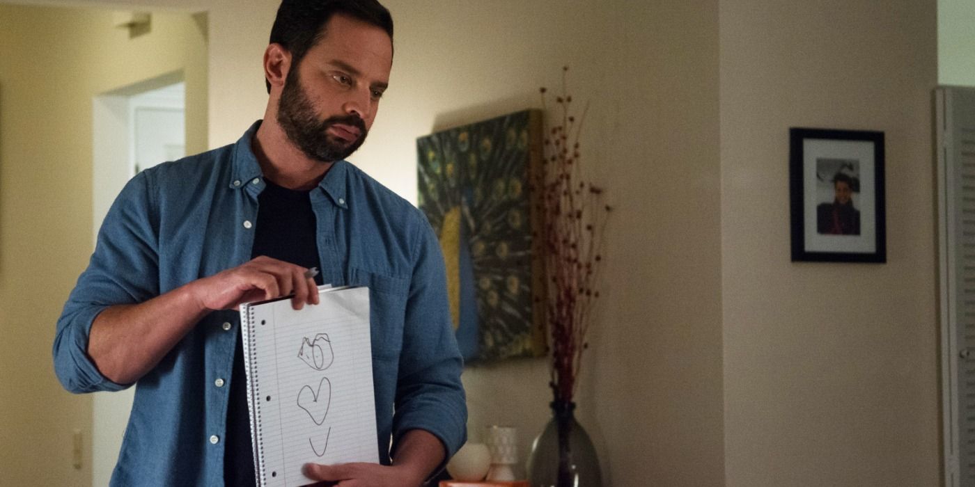Nick Kroll holds up a note in My Blind Brother.