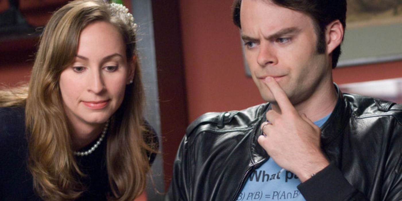 Liz leans over at computer next to Bill Hader in Forgetting Sarah Marshall.
