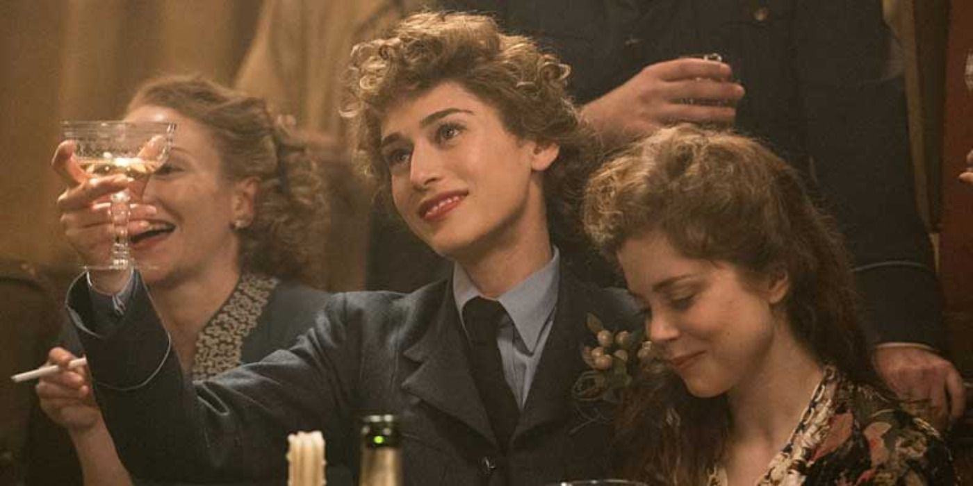Lizzy Caplan raises a glass in Allied.