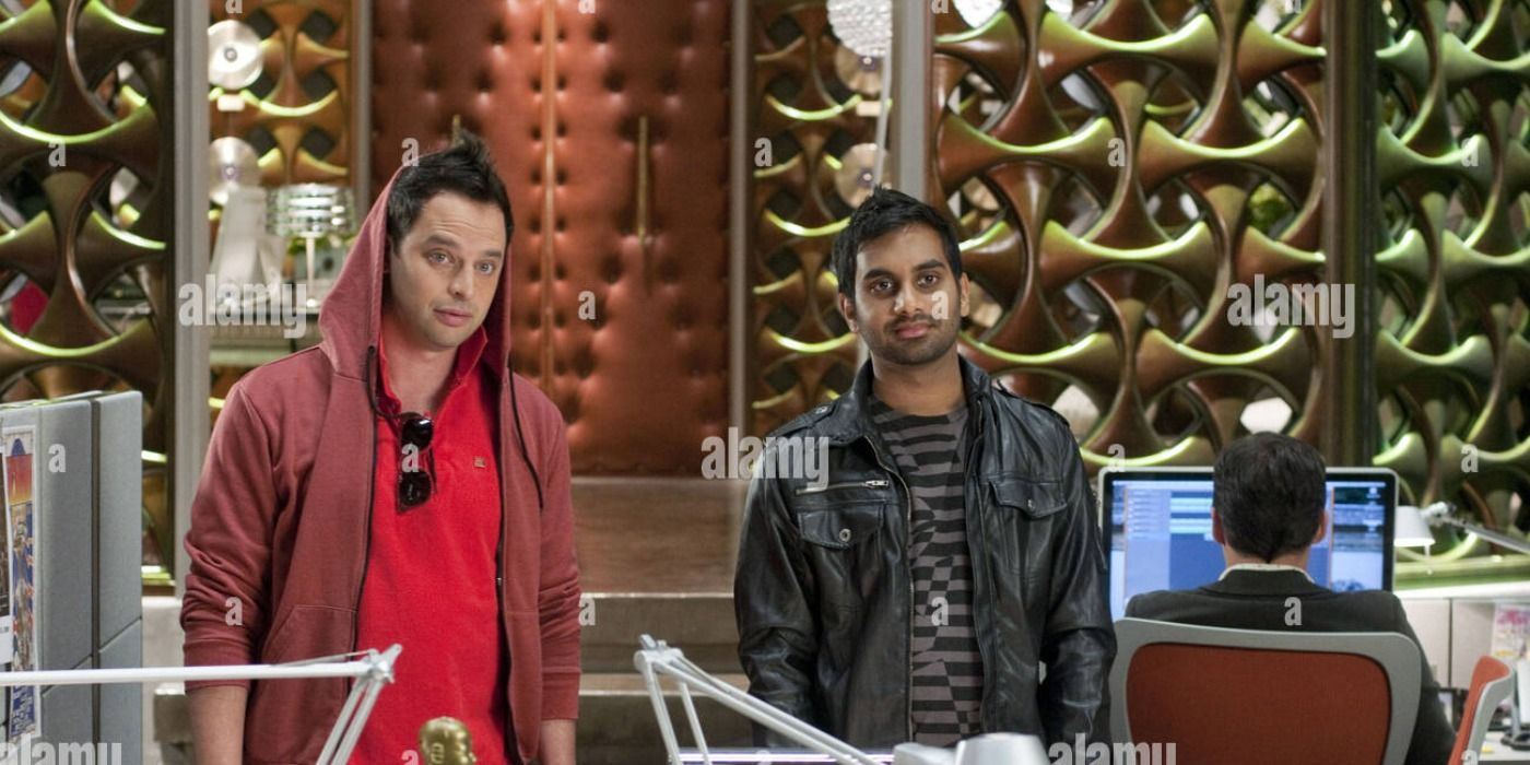 Nick Kroll and Aziz Ansari standing in costume in Get Him To The Greek.