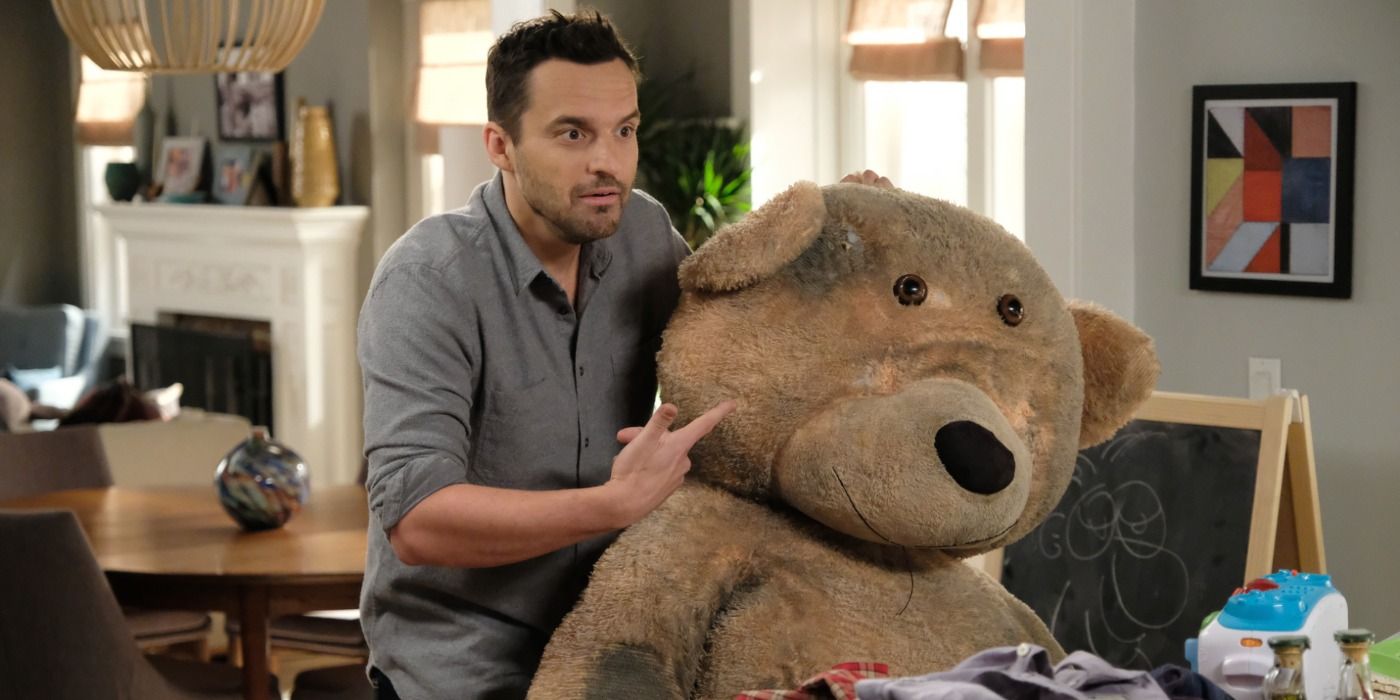 Nick Miller with Ruth's bear in New Girl