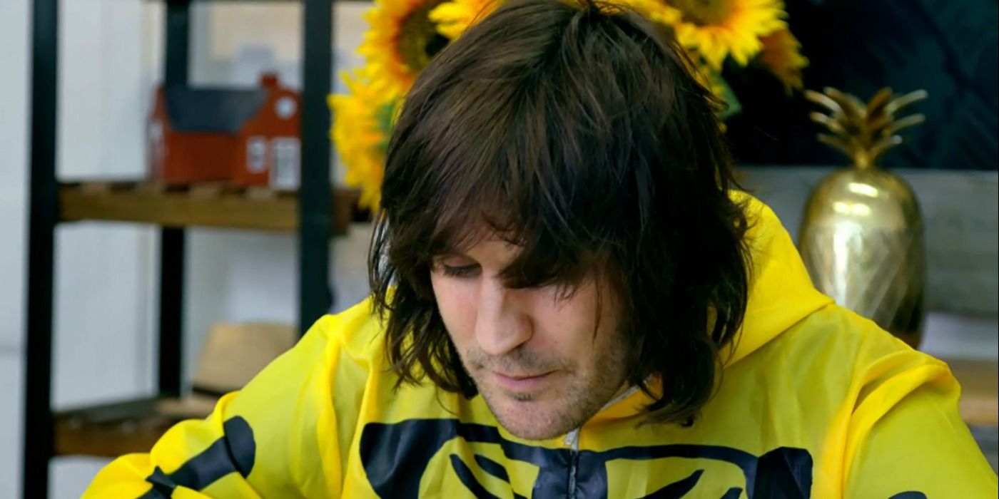 Noel wearing a bright yellow outfit on Taskmaster
