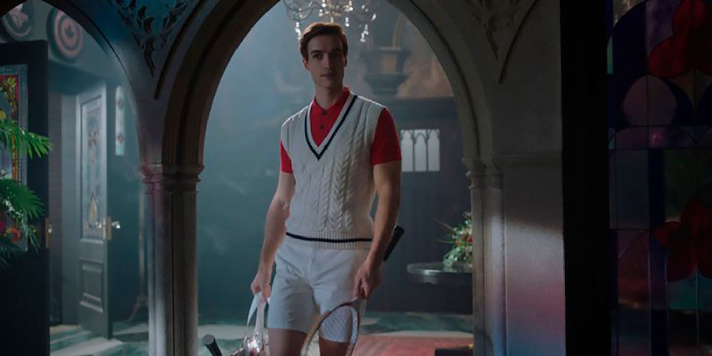 Jason Blossom from Riverdale, standing in tennis gear.