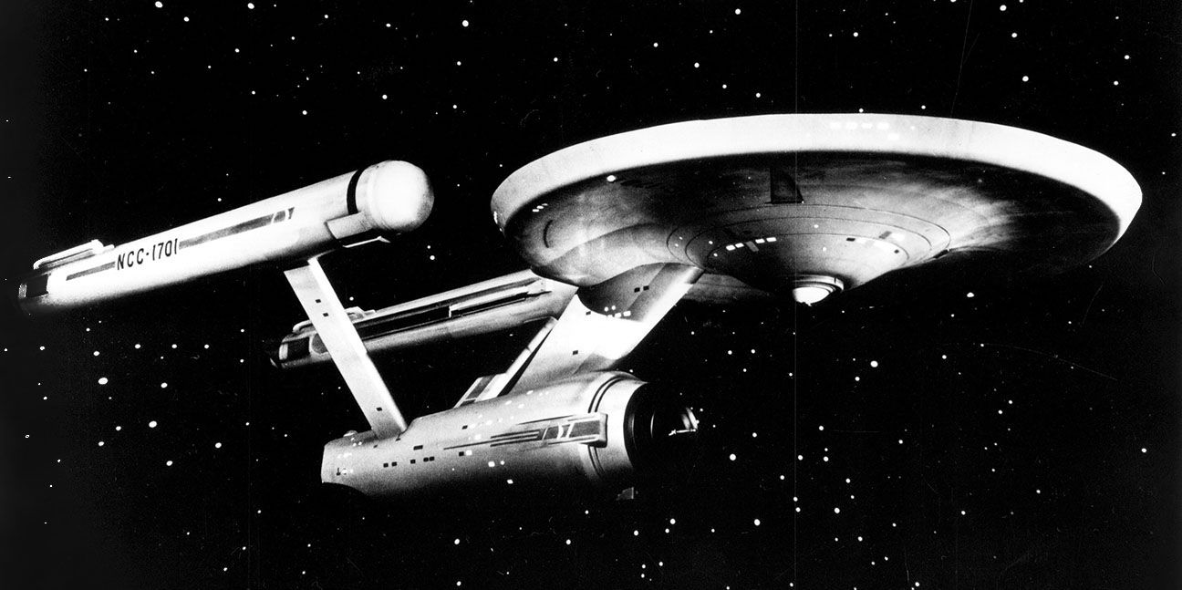 The Original Star Trek Enterprise 1701 is shown in space.