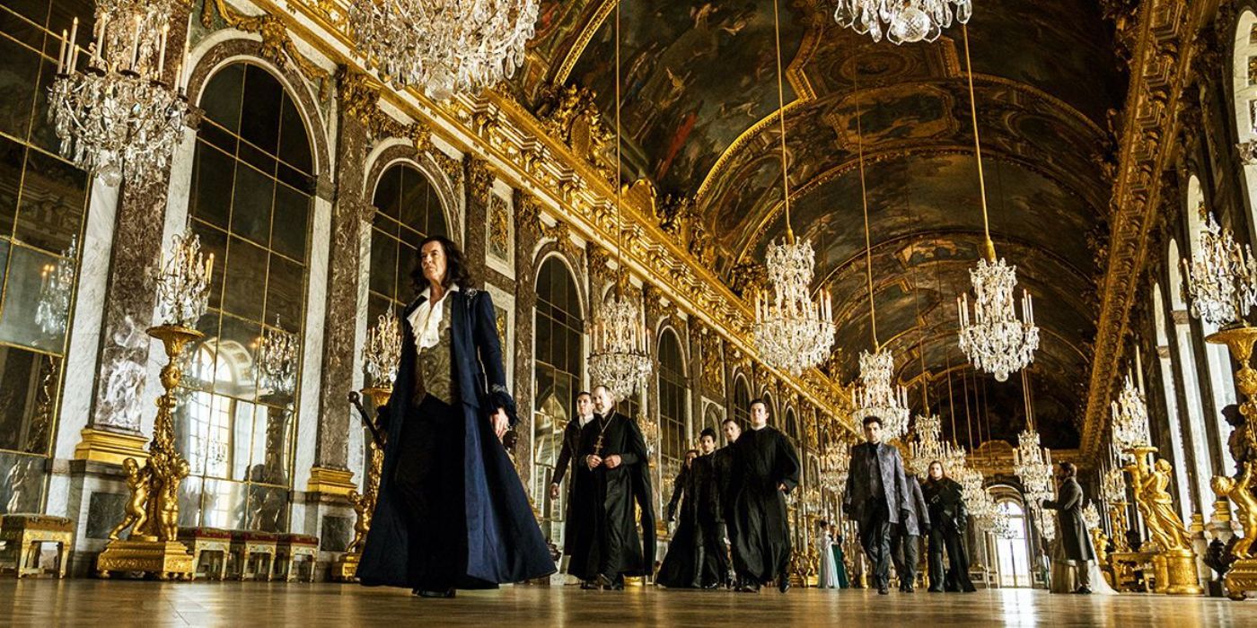 King Louis walks through the halls of Versailles in The King's Daughter
