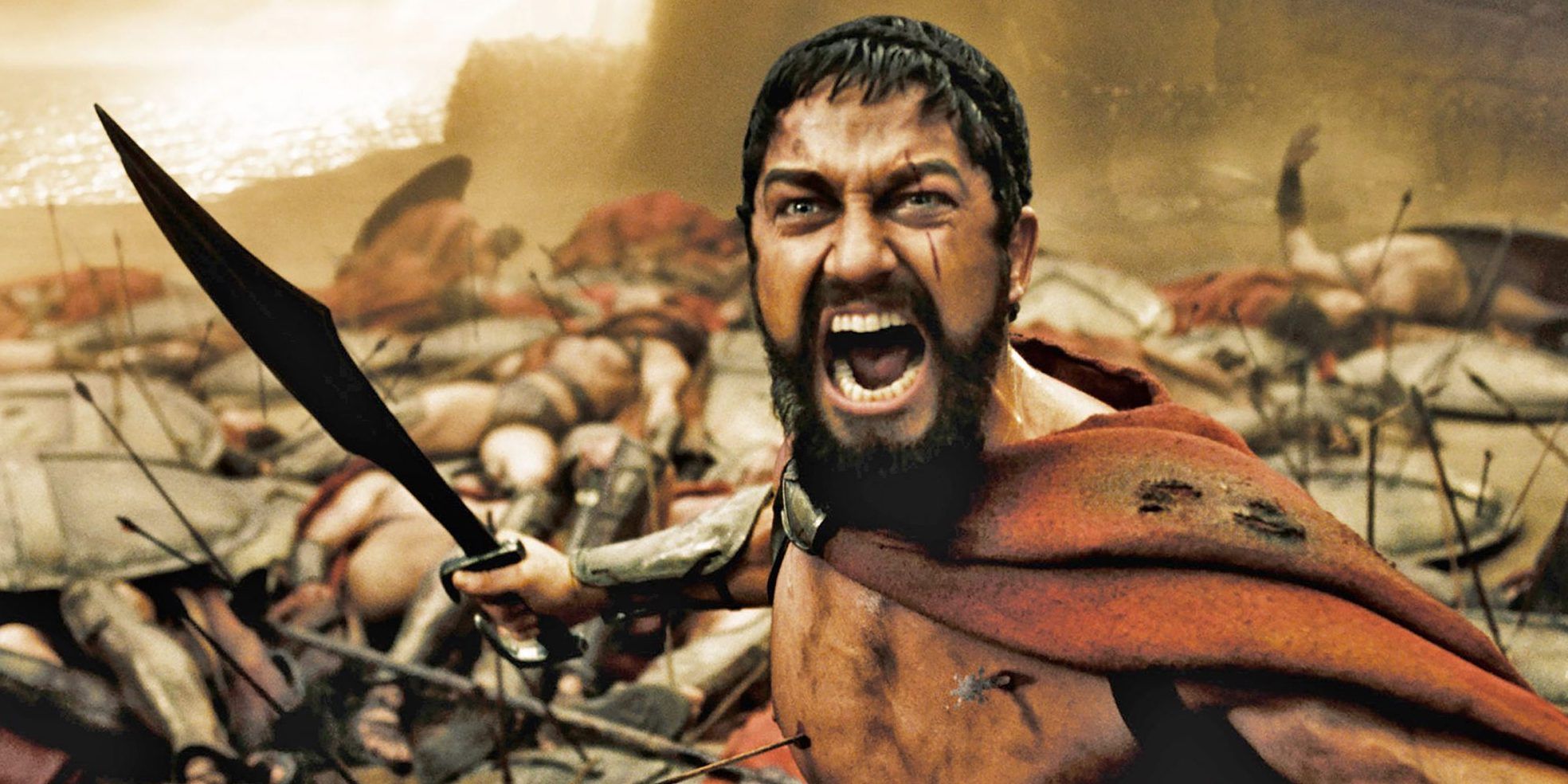 Leonidas empunhando uma espada e rugindo de raiva em 300 (2006)