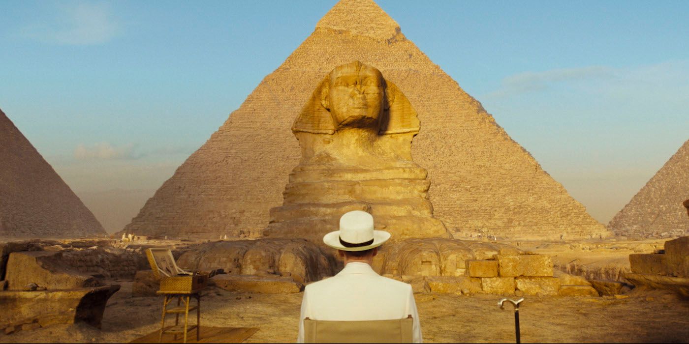 Poirot relaxing in front of the Sphinx in Death on the Nile