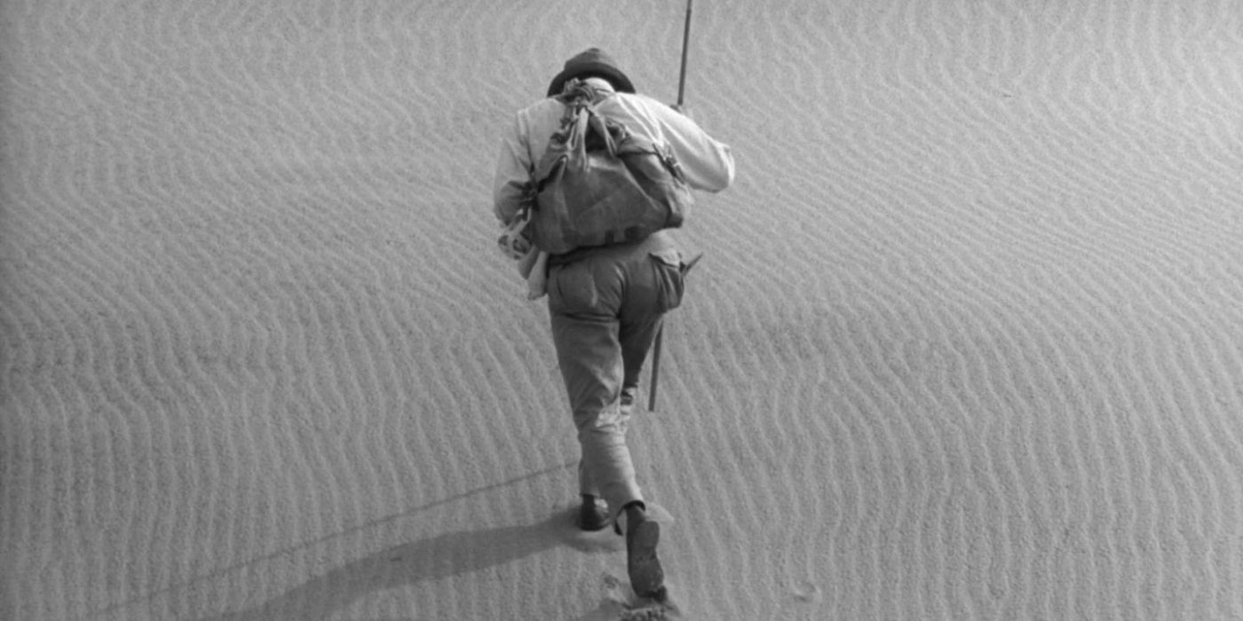 A man in the dessert in Woman In The Dunes.