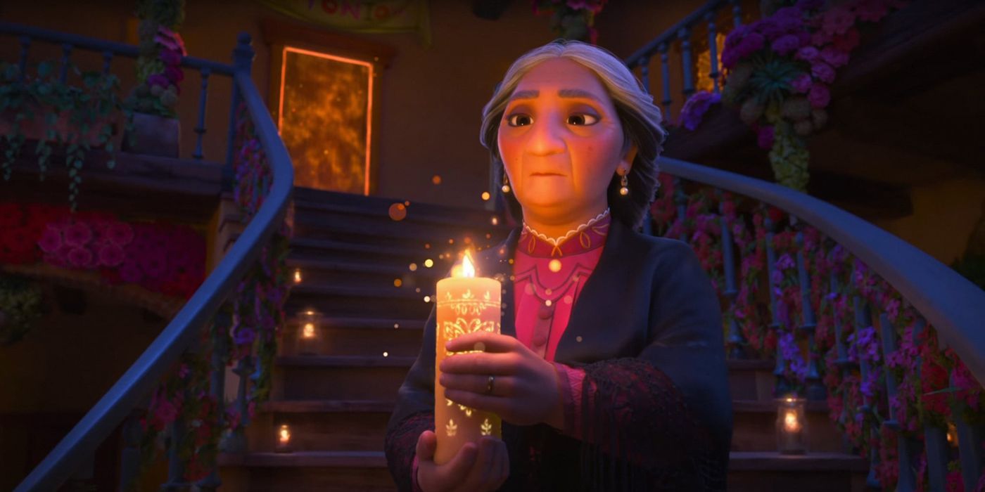 Abuela holding a candle in Encanto.