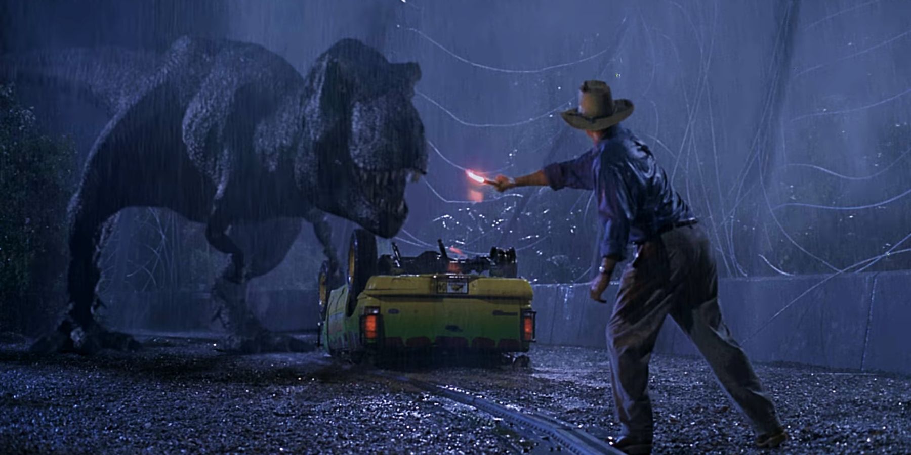 Alan Grant luring Rexy the T-Rex with a flare in Jurassic Park
