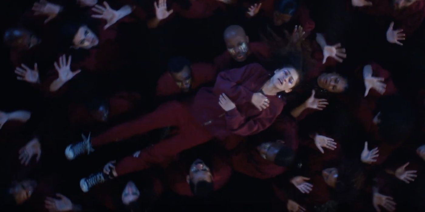 Rue being lifted up and tossed by a choir during the All For Us musical number in Euphoria