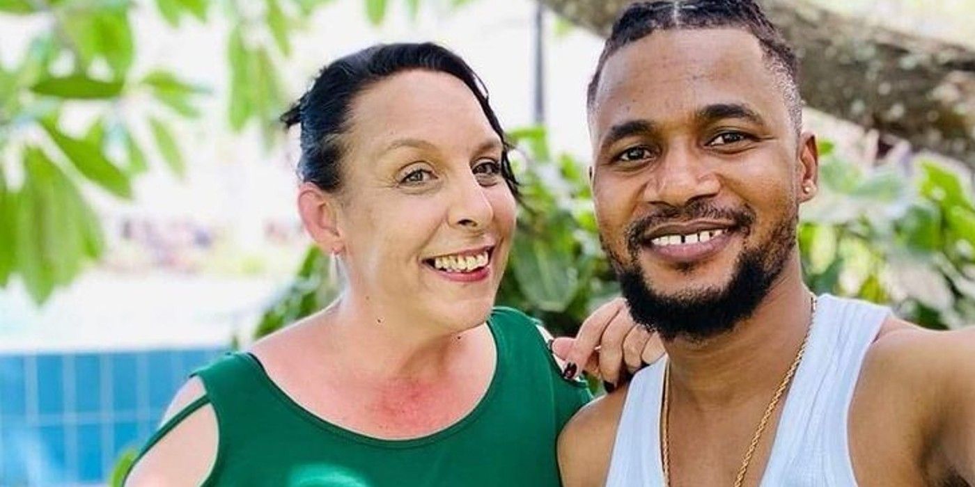 90 Day Fiance stars Kim Menzies and Usman Sojaboy Umar smiling together outside