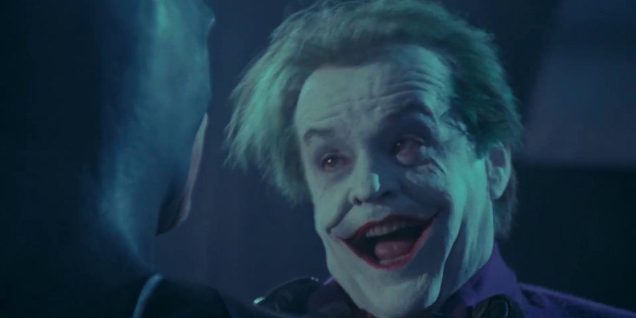 Batman punches the Joker in Batman (1989)