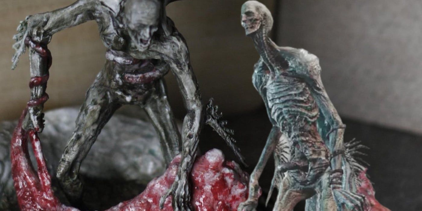 Bloodborne Orphan of Kos statue next to in-game model