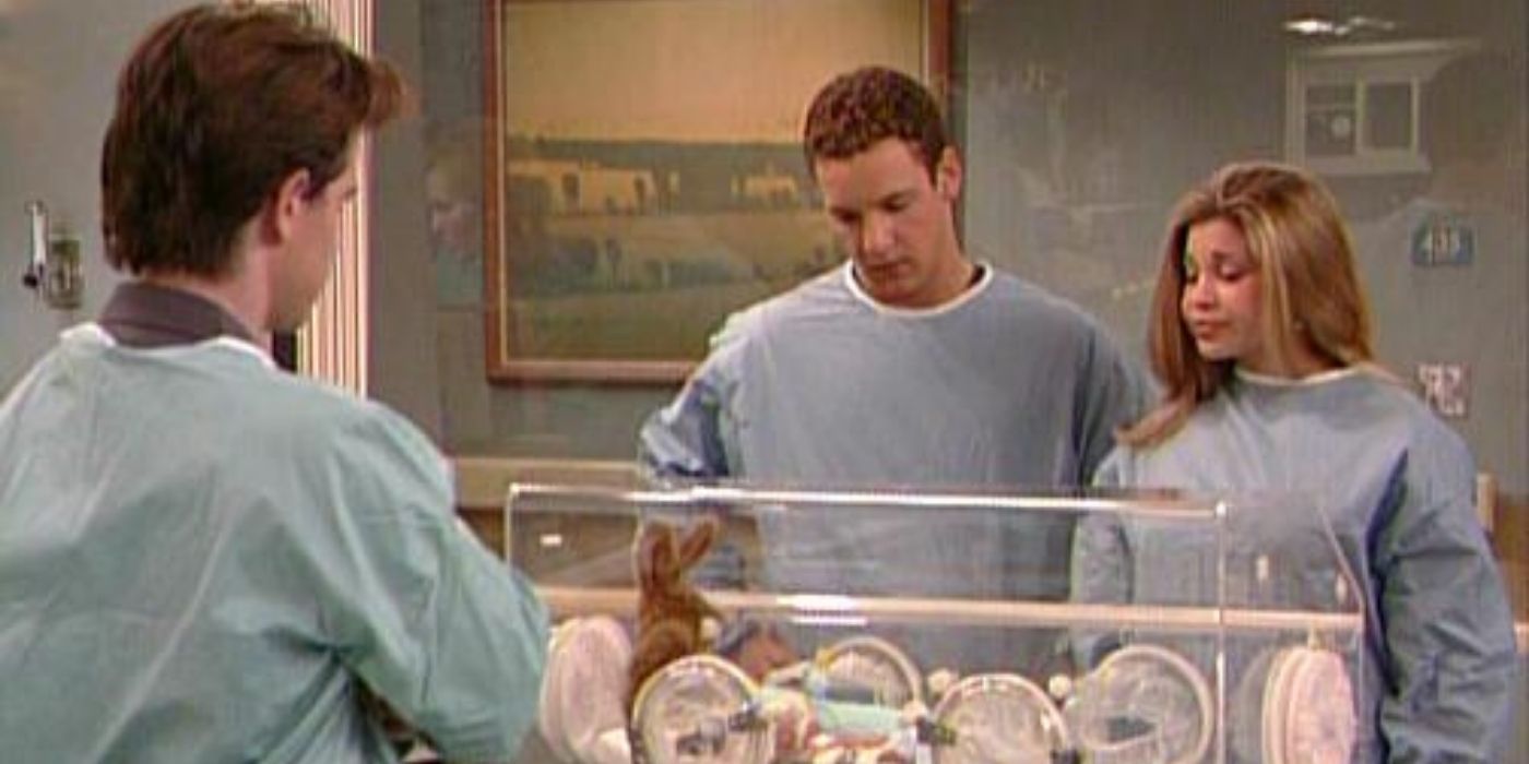 Shawn, Cory, and Topanga looking at a baby in an incubator in Boy Meets World