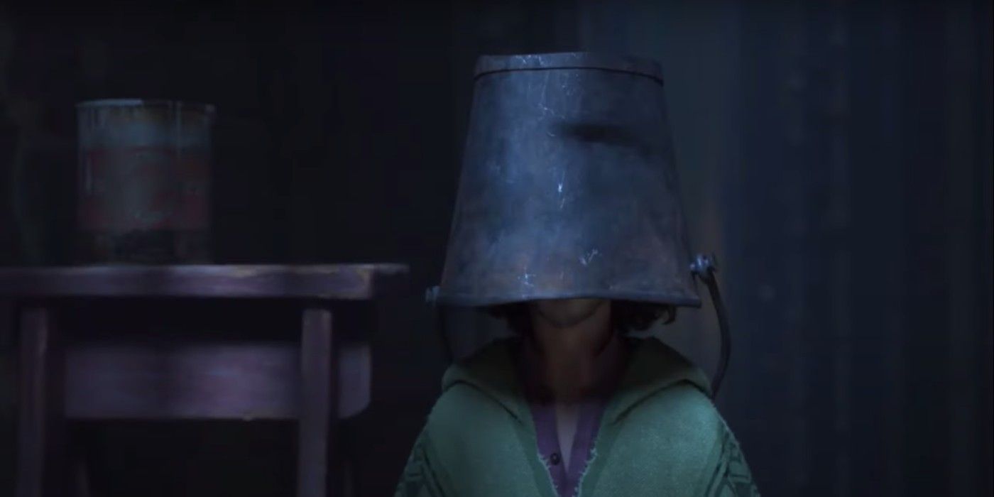 Bruno Acting As His Alter Ego, With a Bucket On His Head