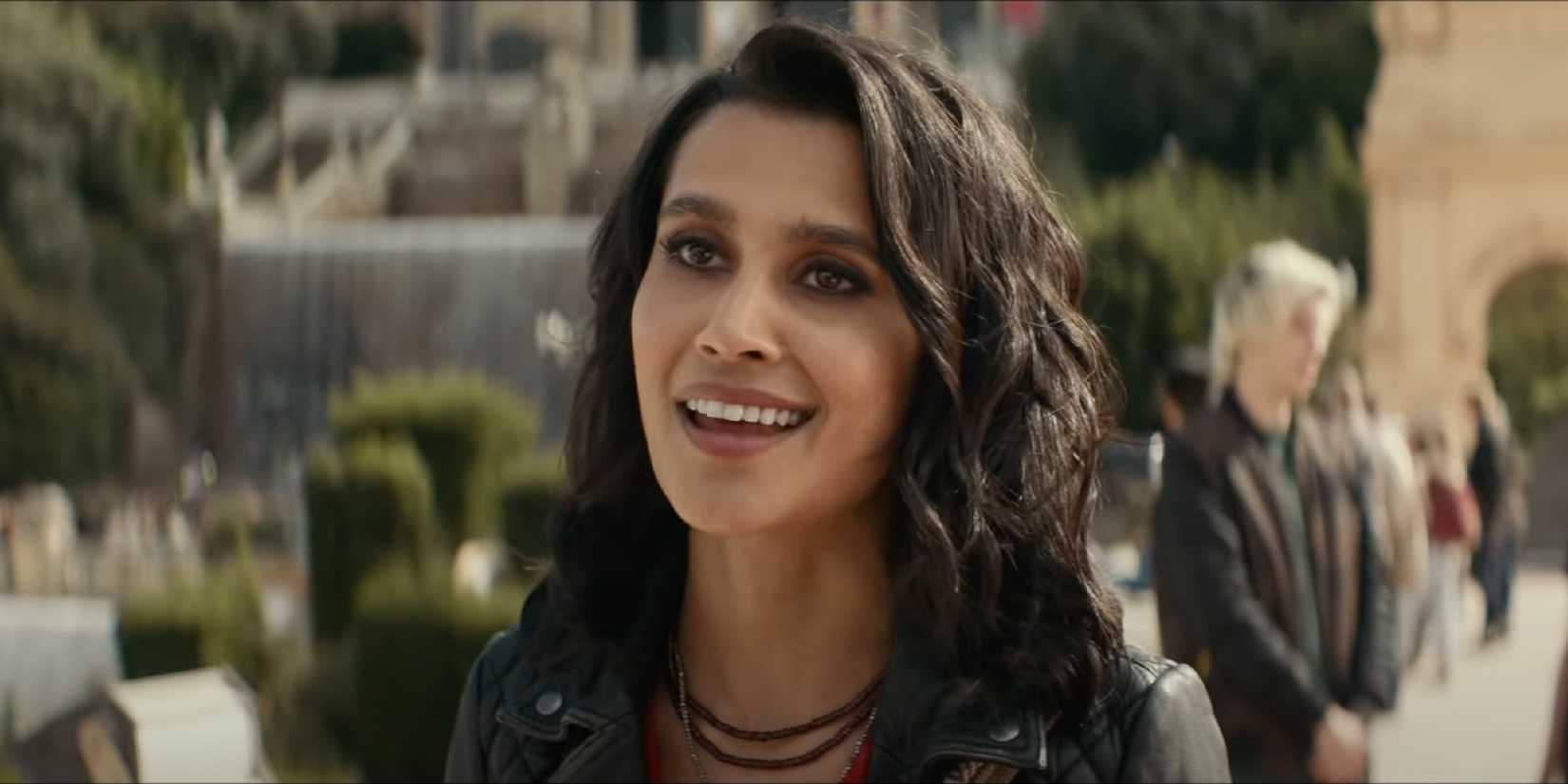 Sophia Ali smiling as Chloe Frazer Uncharted