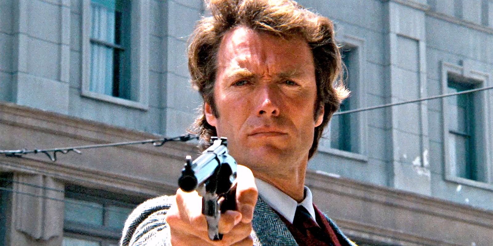Harry Callhan pointing a gun in Dirty Harry.