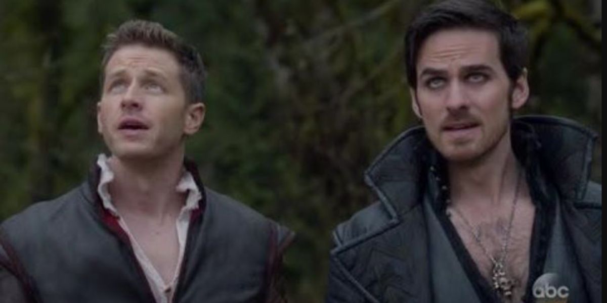 David and Hook looking worriedly up at the sky in Once Upon A Time