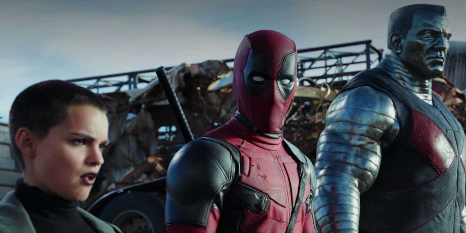 Three characters from Deadpool standing.
