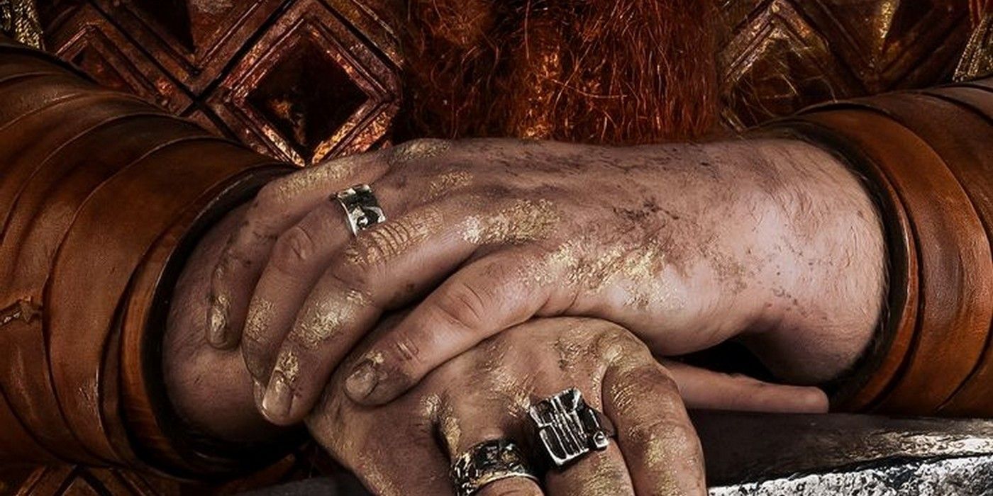 The hands of a Dwarf in Lord of the Rings Rings of Power