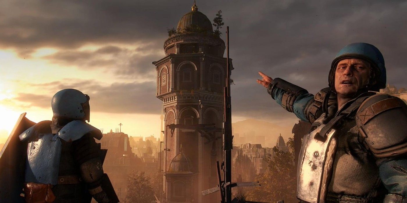 Dying Light 2 faction members pointing at a tower off in the distance
