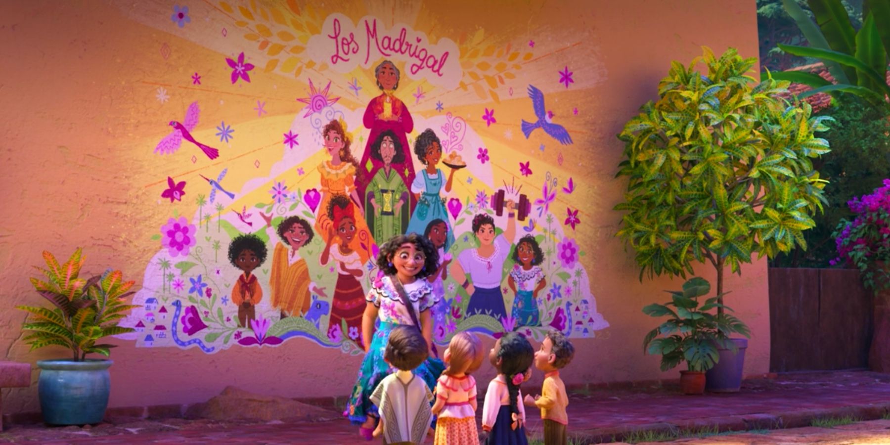 Mirabel showing the village kids the mural of her family in Encanto