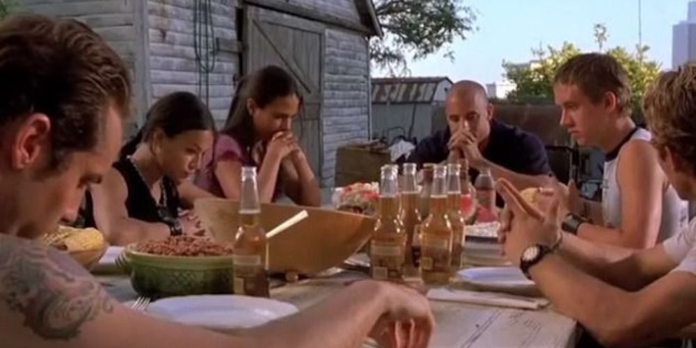 Jesse prays for dinner in Fast and Furious (2001)