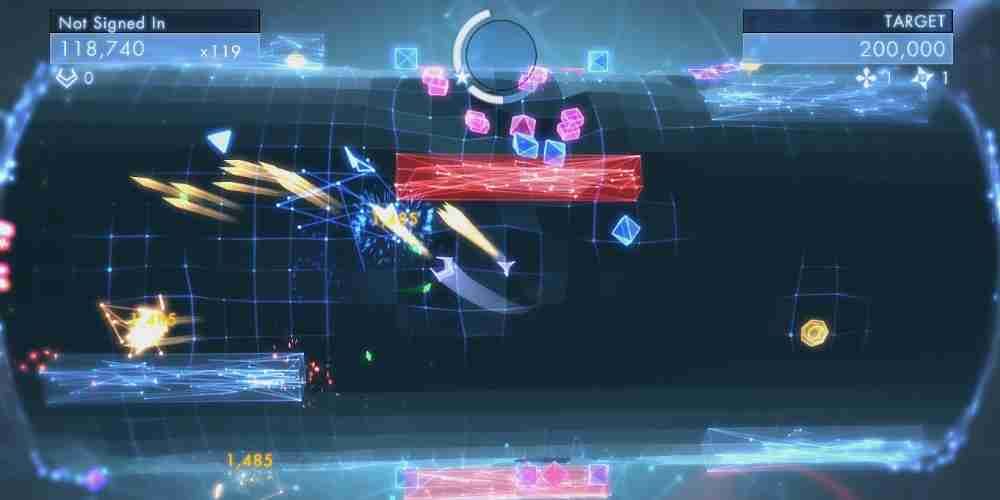 In Geometry Wars 3, the player is shooting a bunch of triangles, and about to shoot some boxes.