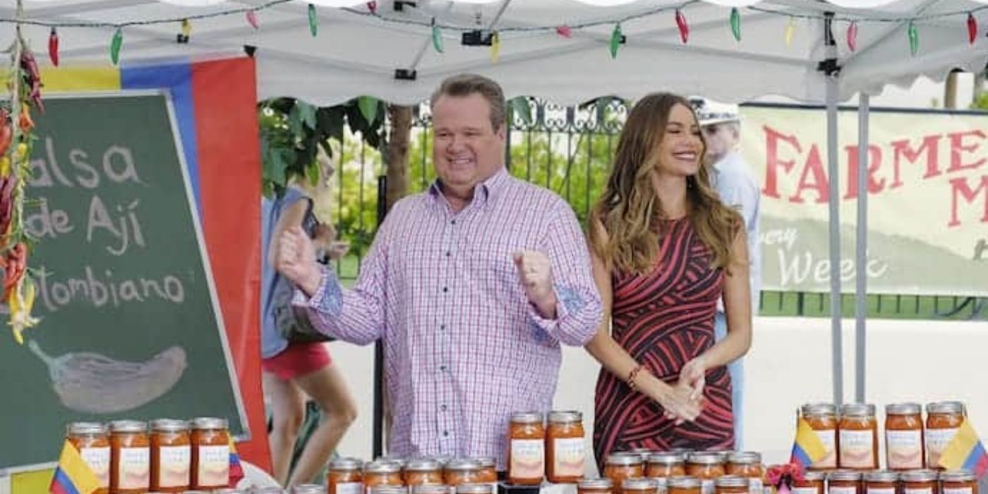 Gloria and Cam selling sauce on Modern Family