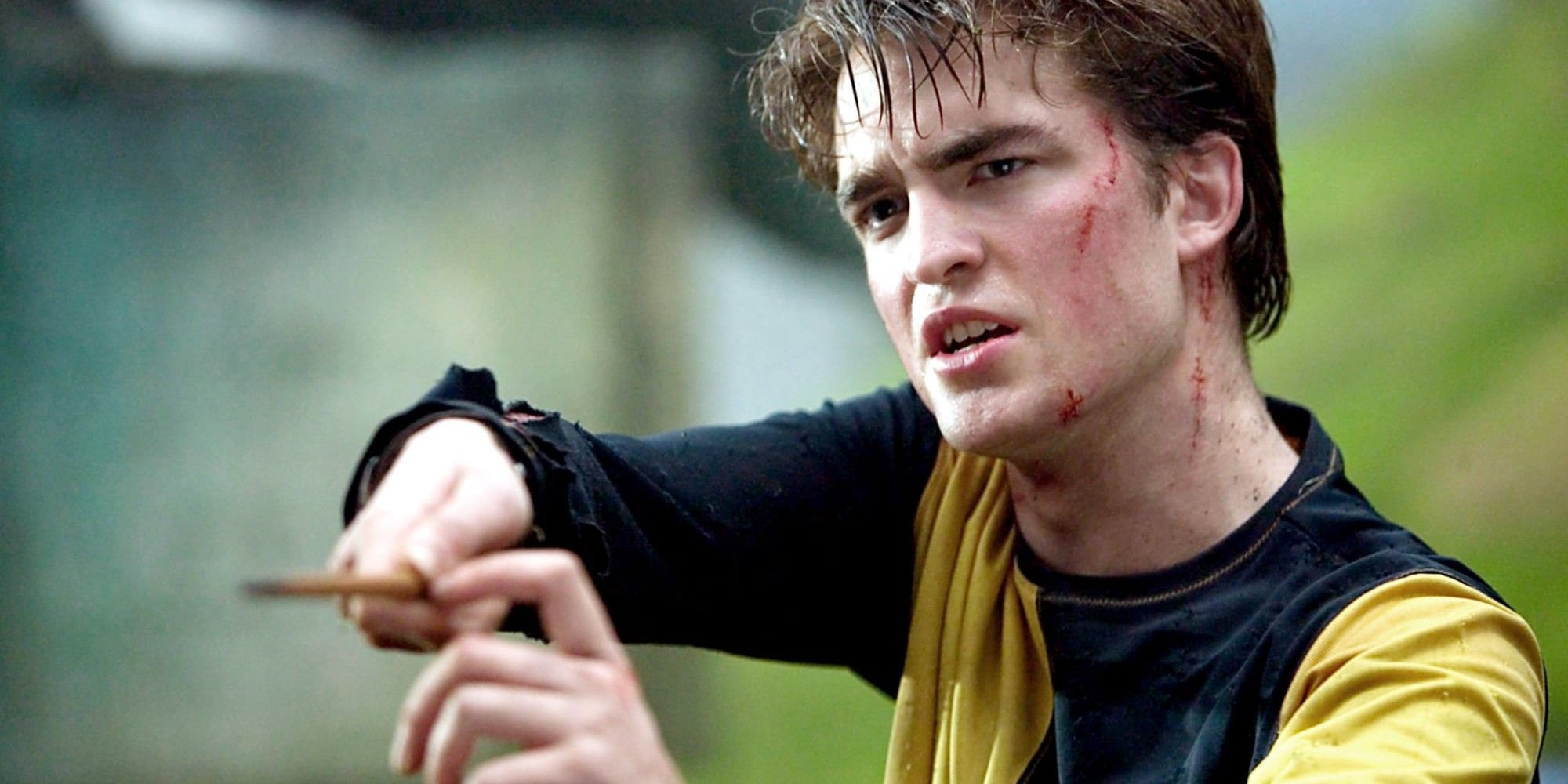 Harry Potter Goblet of Fire Robert Pattinson holding wand
