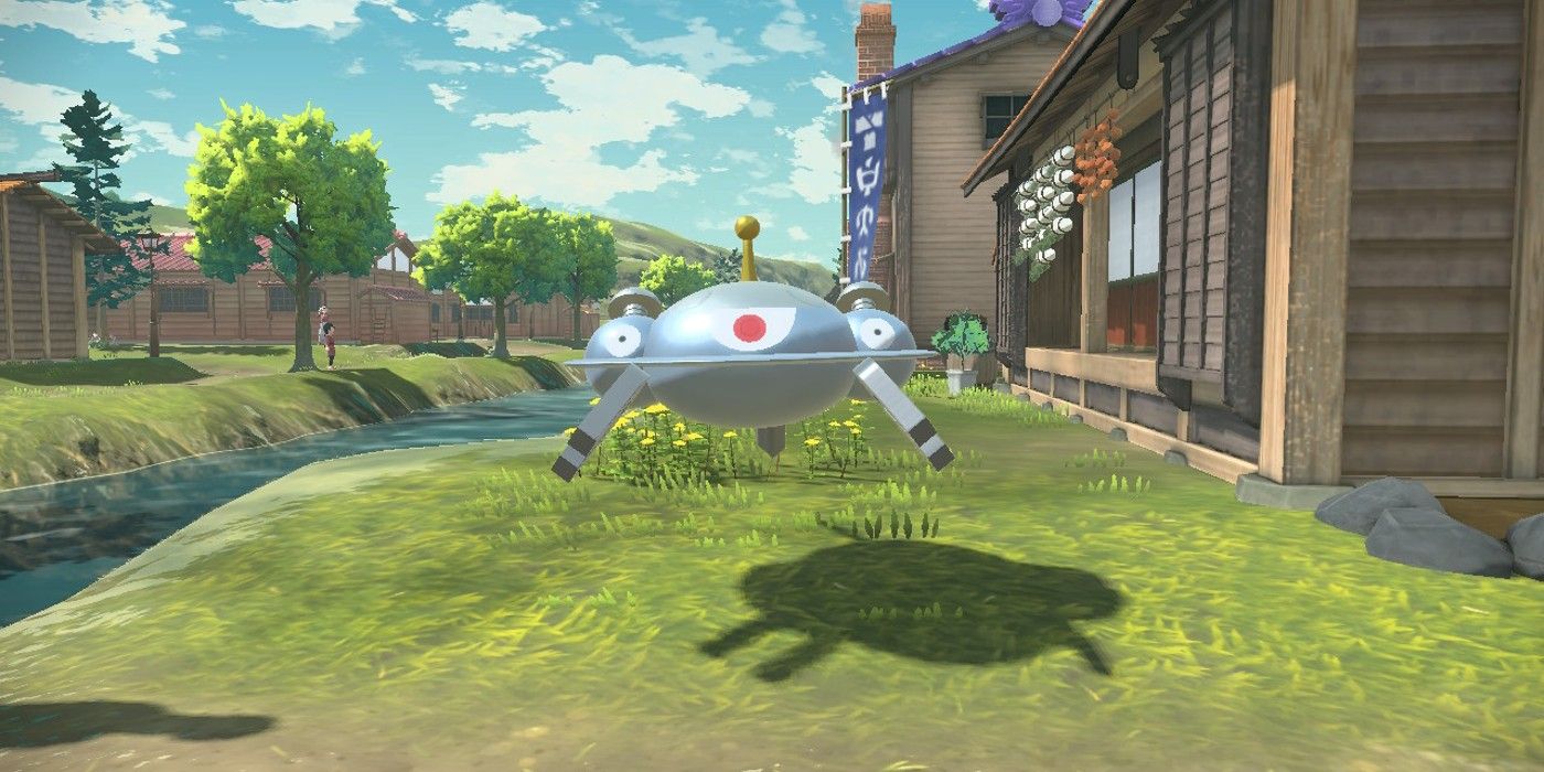 Magnezone hovering over a roadside in Jubilife Village in Pokémon Legends: Arceus