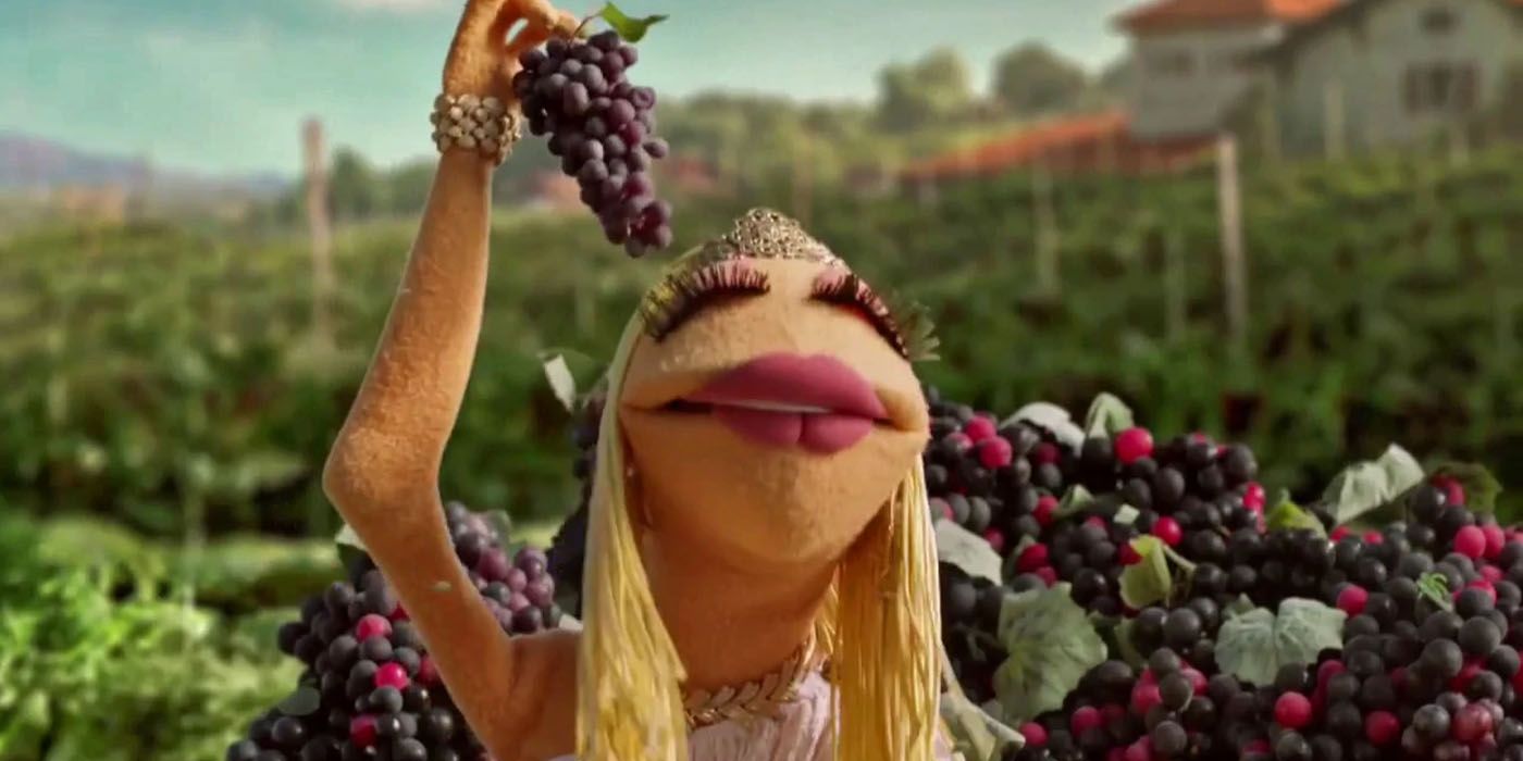 Janice with a bunch of grapes on the Muppets